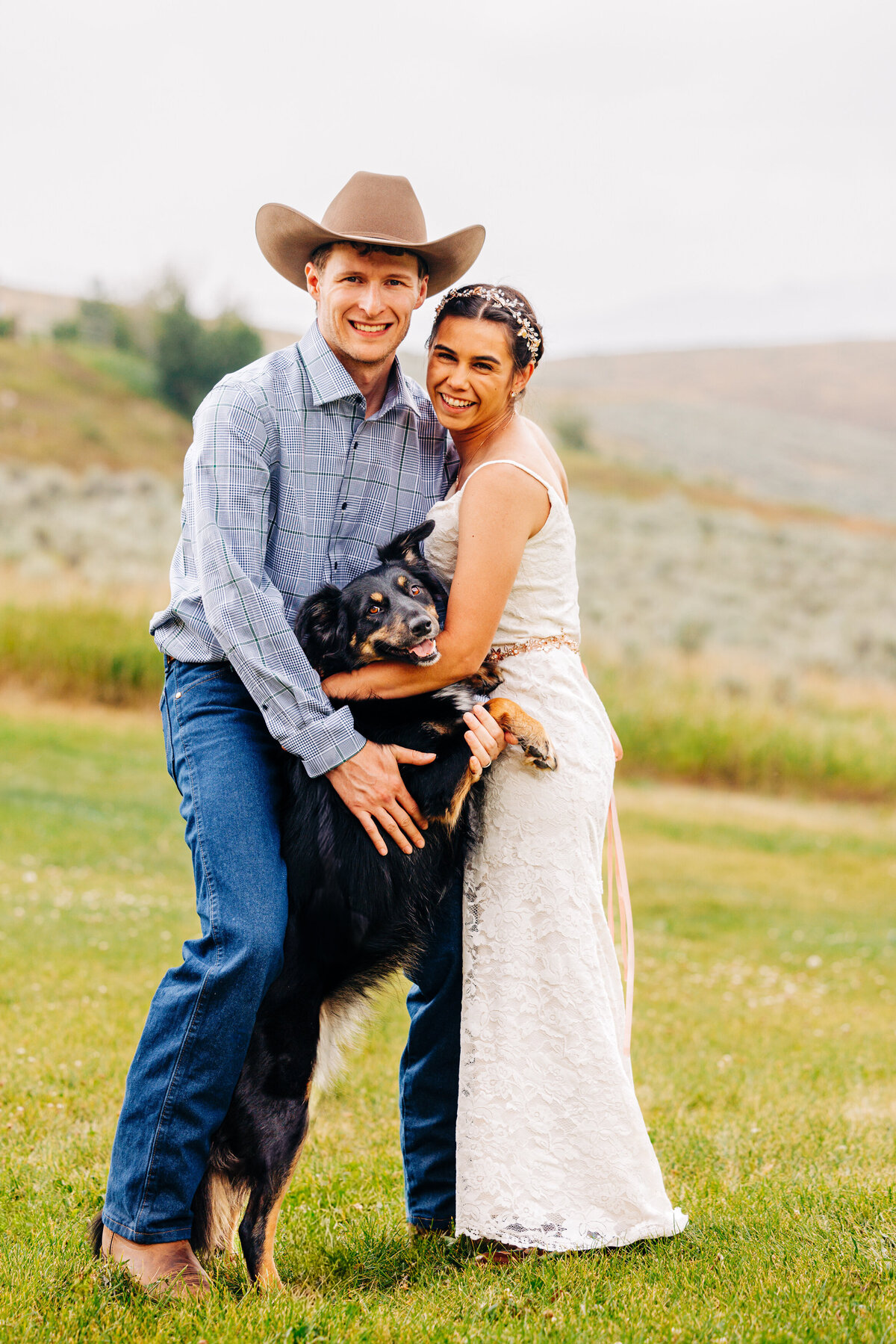 Portrait bride and groom with dog at Wilderness Edge in Cameron, MT