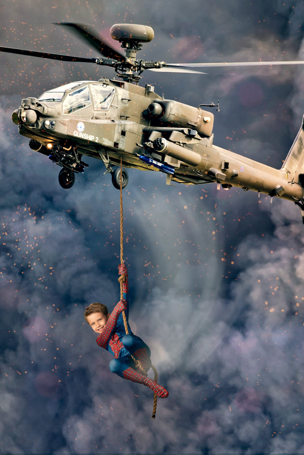 Action-packed portrait of a young child dressed as spiderman mid-rescue, descending from a helicopter in an adventurous scene. Captured in Overland Park, Kansas, this exciting setup is perfect for families seeking thrilling and imaginative child photography.