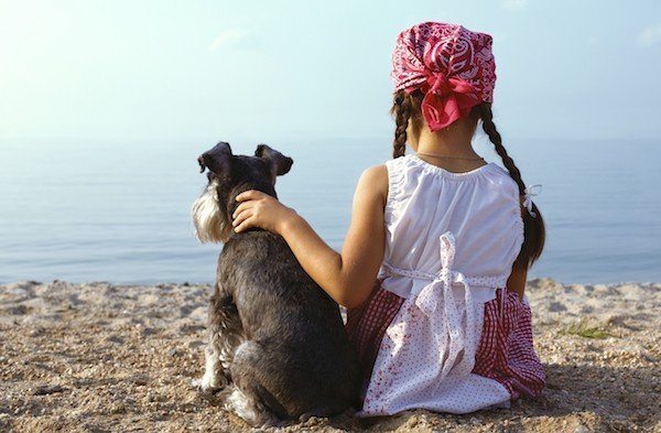 girl-with-dog-on-beach-sereno-copy