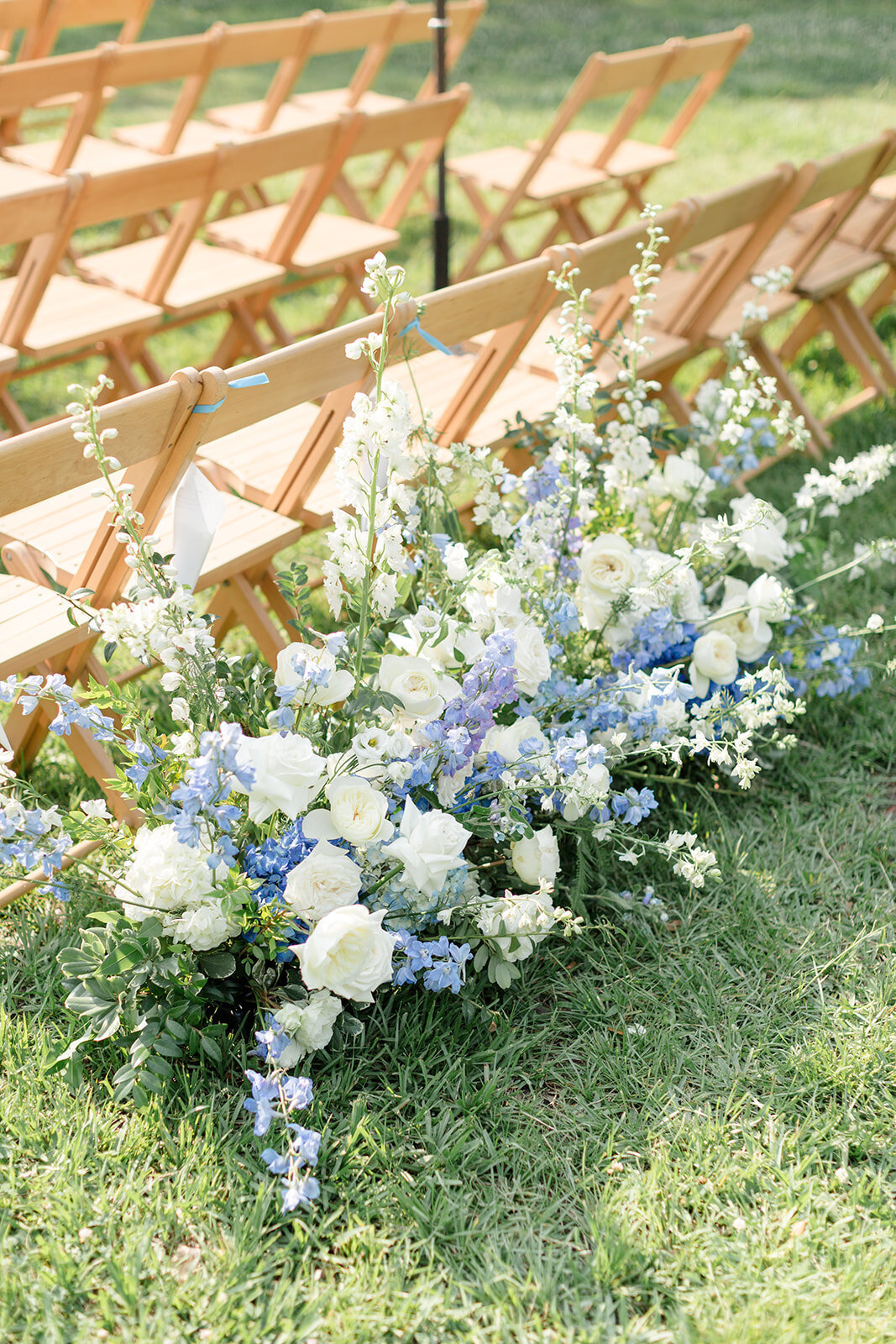 Aisle decor florals; blue and white; Lowndes Grove, Charleston, South Carolina