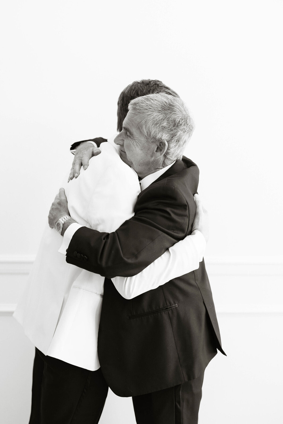 37_groom-father-hug
