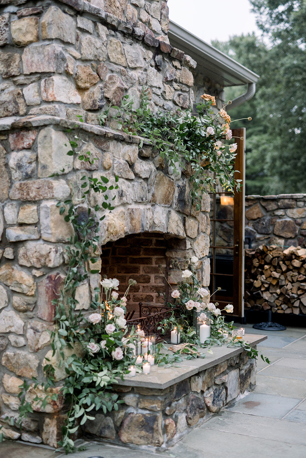 Kate Campbell floral september backyard elopement moody neutrals firplace side angle