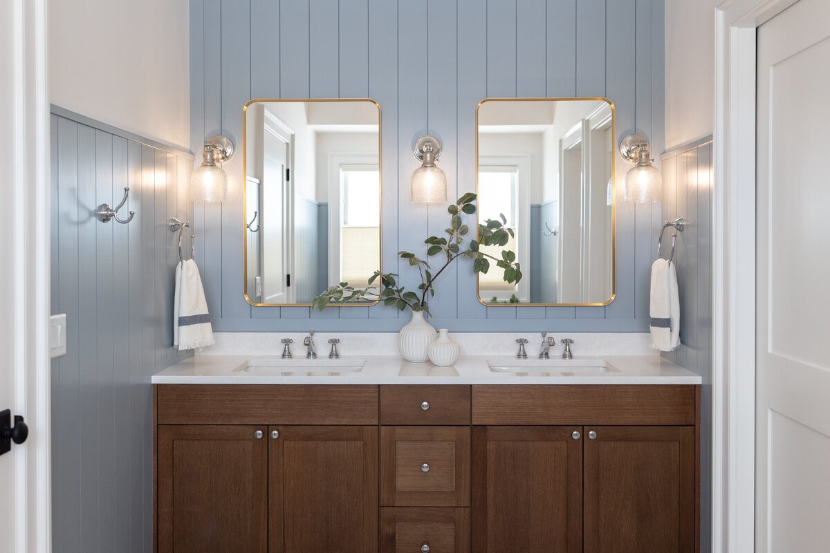 michele rosenboom design cozy colonial bathroom with gold mirrors