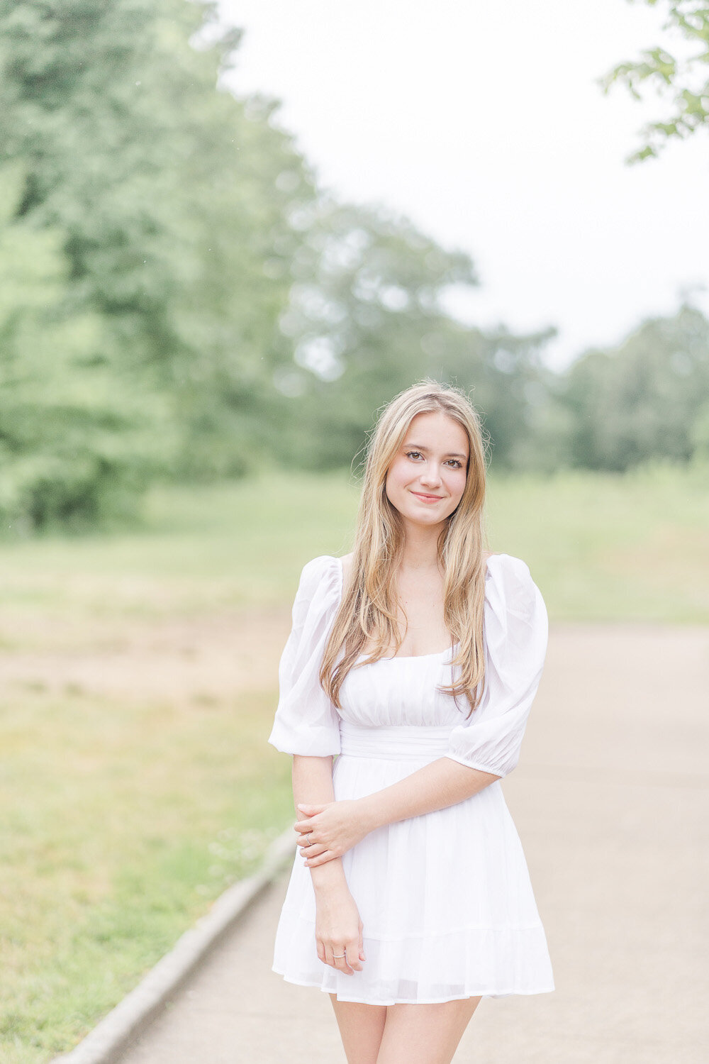 high school girl smiling for her Gainesville, Virginia senior pictures