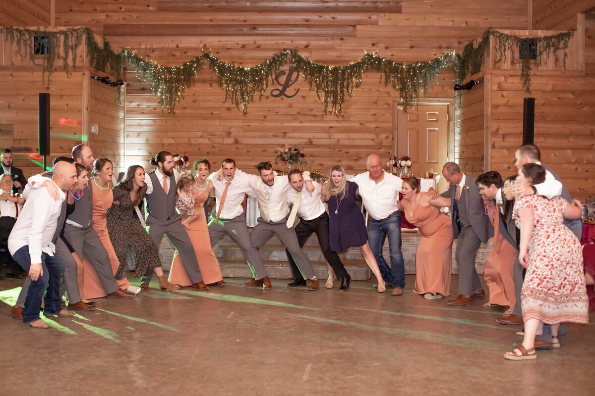 Aggie war hymn during wedding at Geronimo Oaks