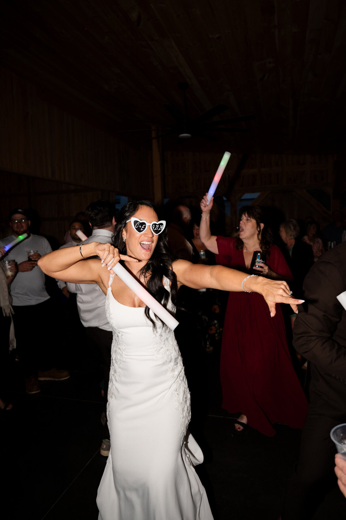 The bride celebrating her wedding on the dance floor at Knotting Hill Farm in Jordanville, NY.