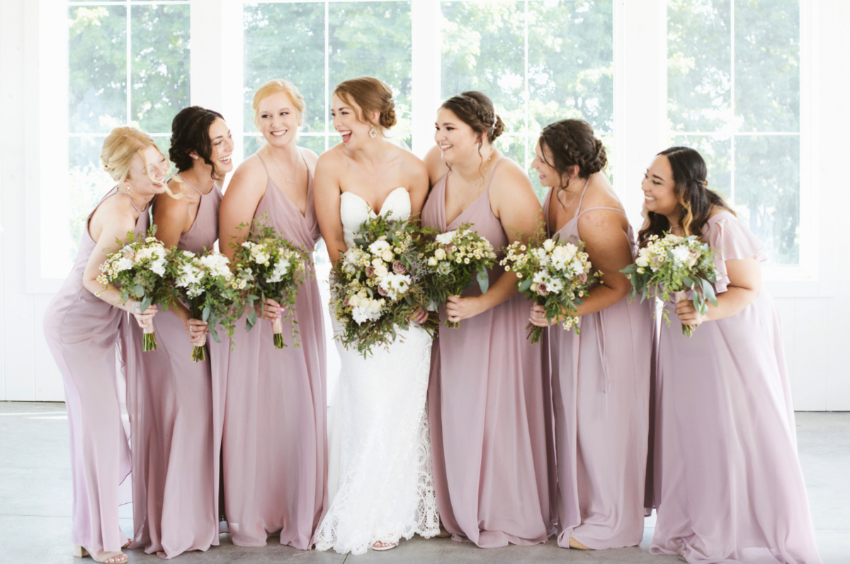 Brides standing together