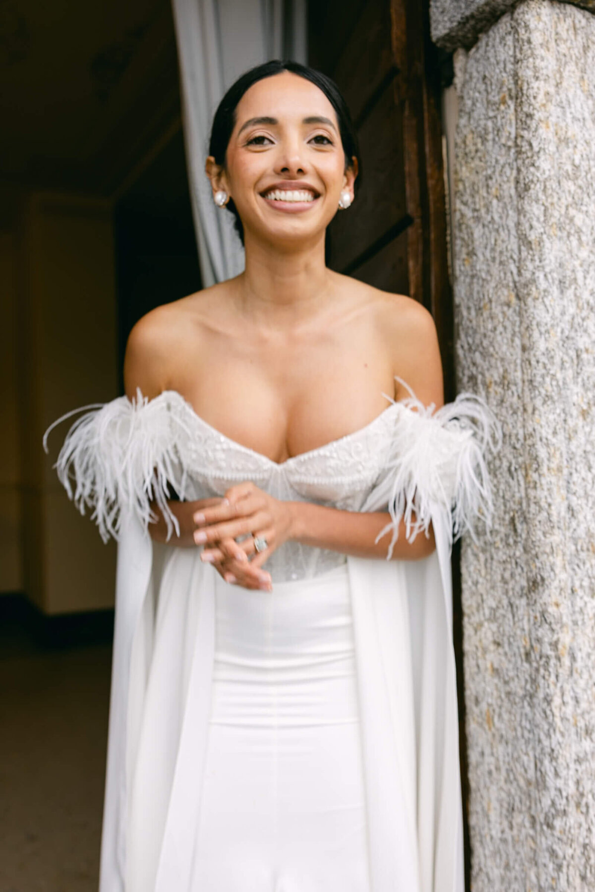 A wedding day bridal shot of a bride in her white dress at Villa Aura del Lago on lake como in Italy