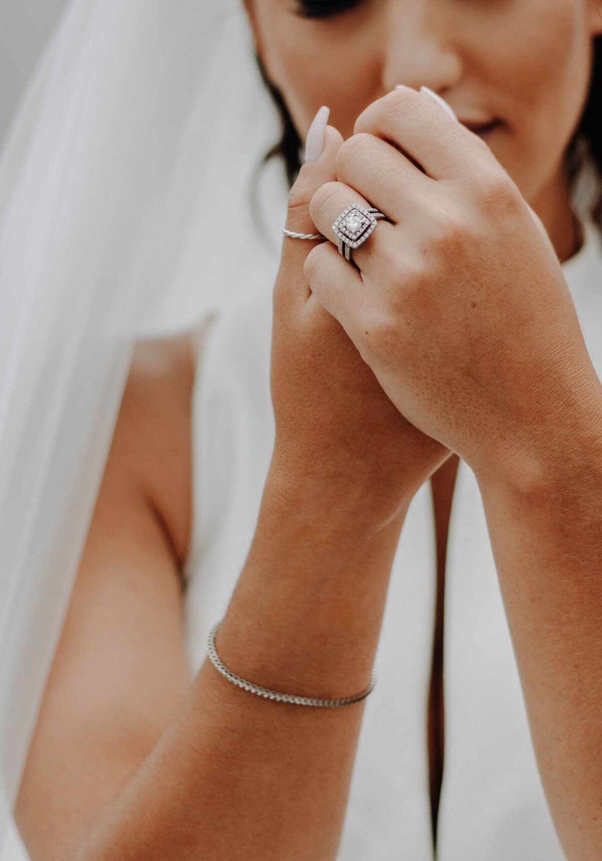 Close-up of Bride Showing Engagement Ring on Hand