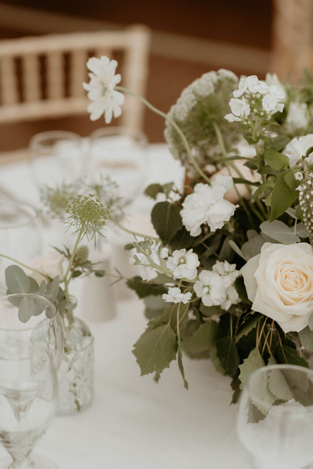 white blooms on wedding reception tables