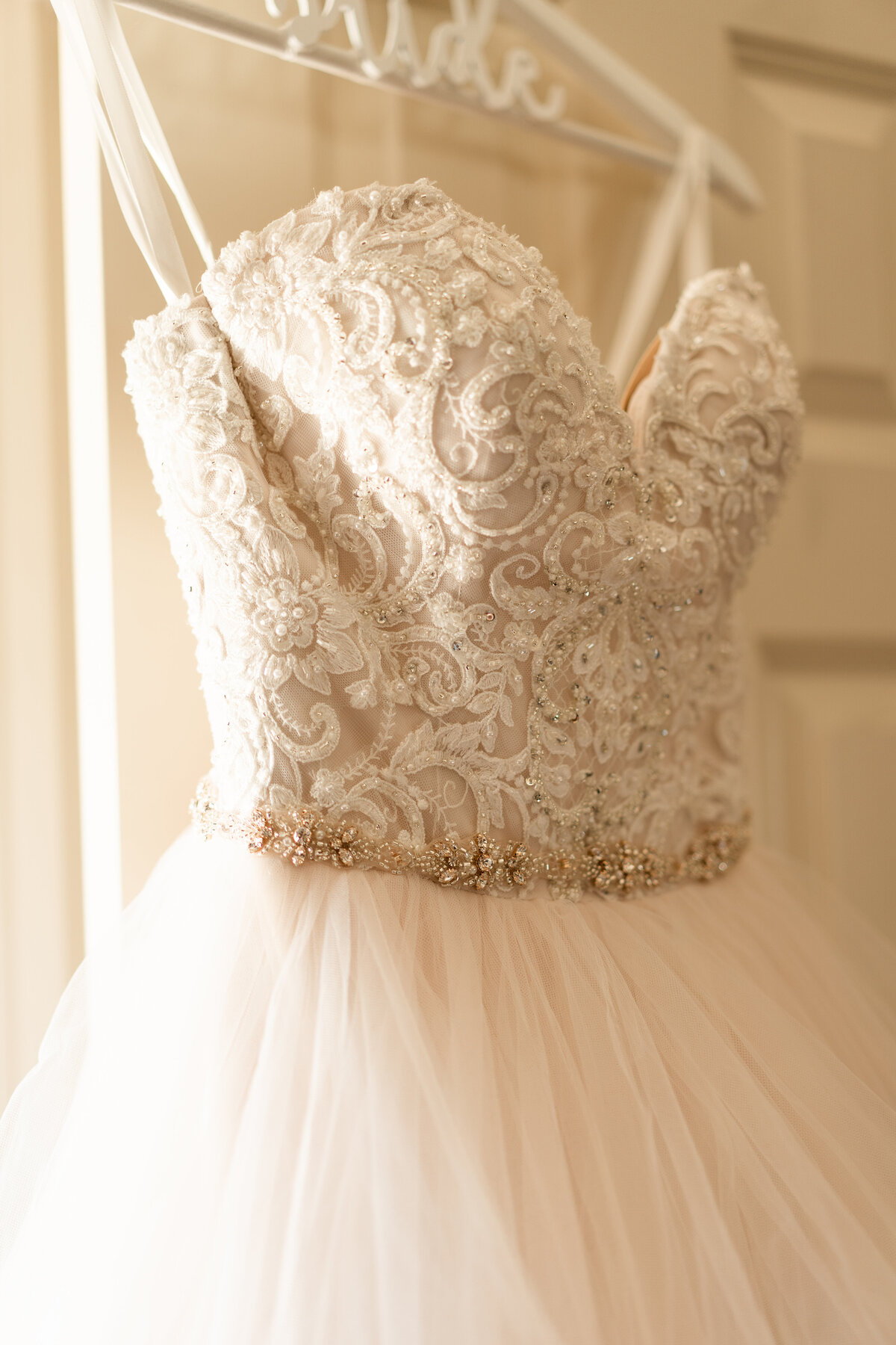 Amber Atchley's wedding dress containing lace, beading and just the right amount of sparkle.