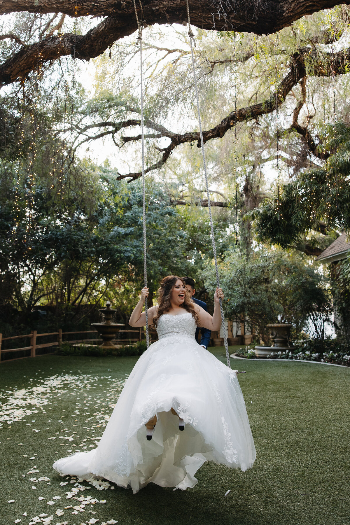 green gables wedding venue, bride and groom on swing