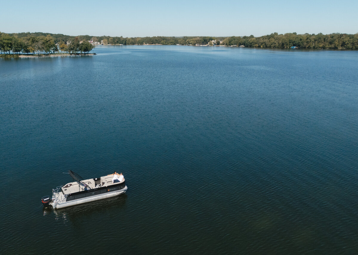 pontoon boat on a lake in east troy