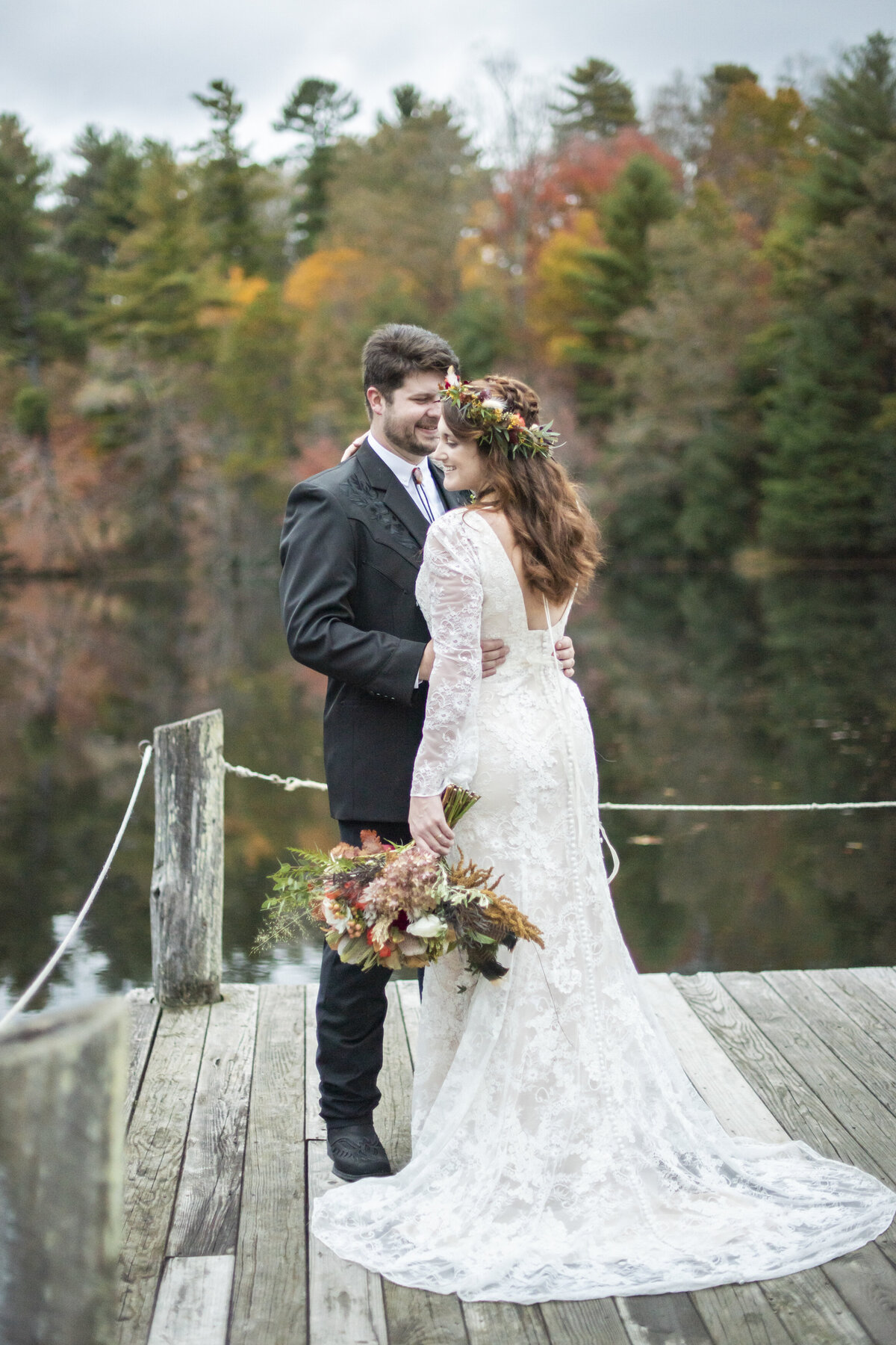 Couples portrait on dock Highland Lake Inn wedding photography Flat Rock, NC