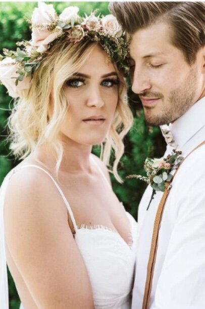 Bride wearing a flower crown and Groom  at backyard wedding