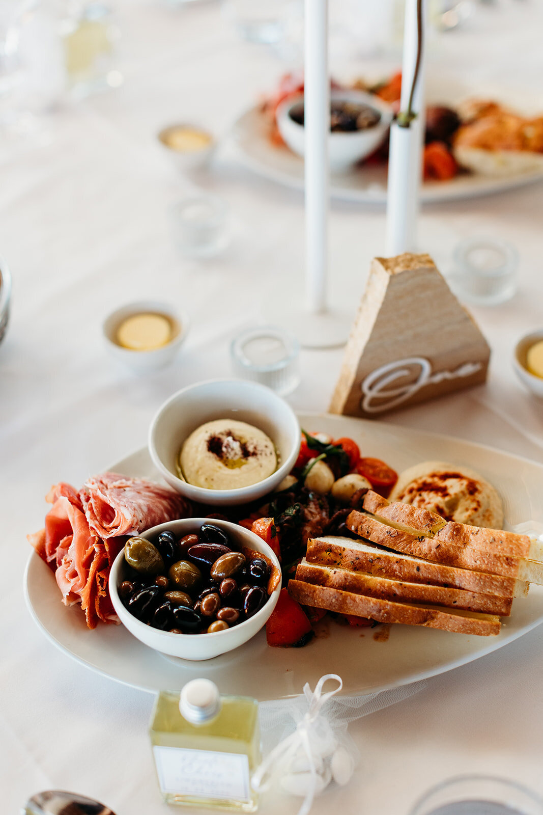 Dips, olives, crusty bread and other canapés served during cocktail hour at The Marion