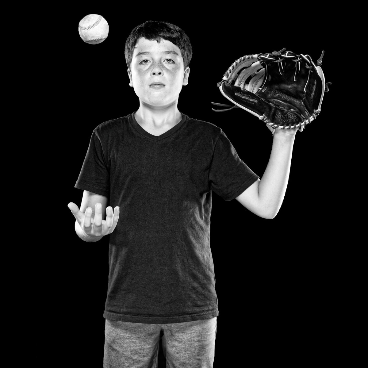 boy with baseball and glove black white portrait
