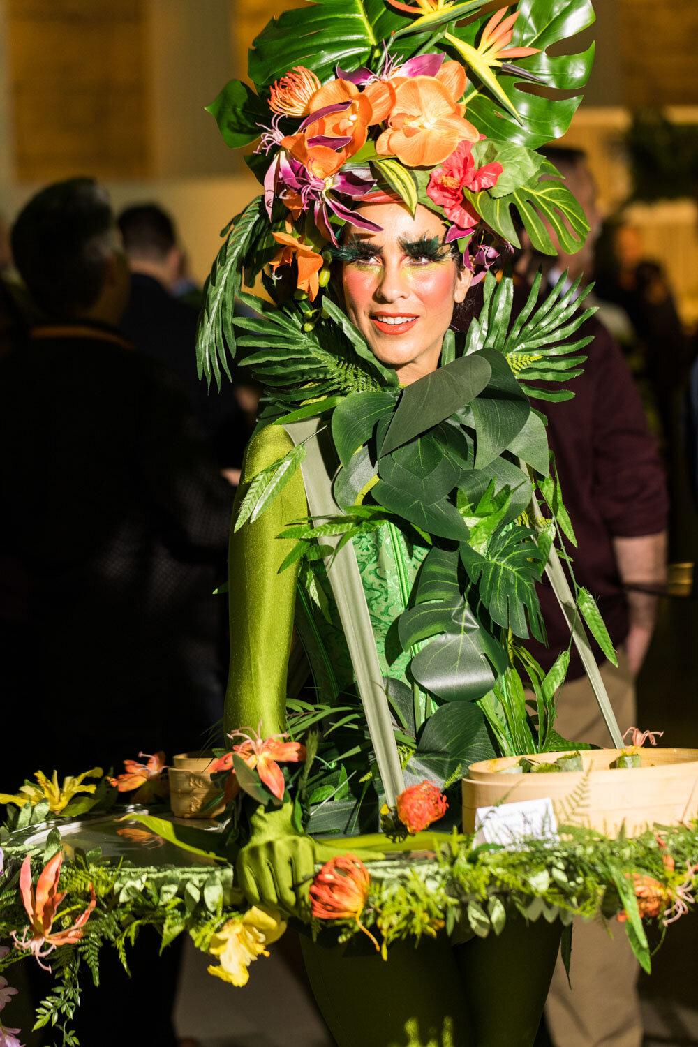 Person wearing greenery for a corporate event