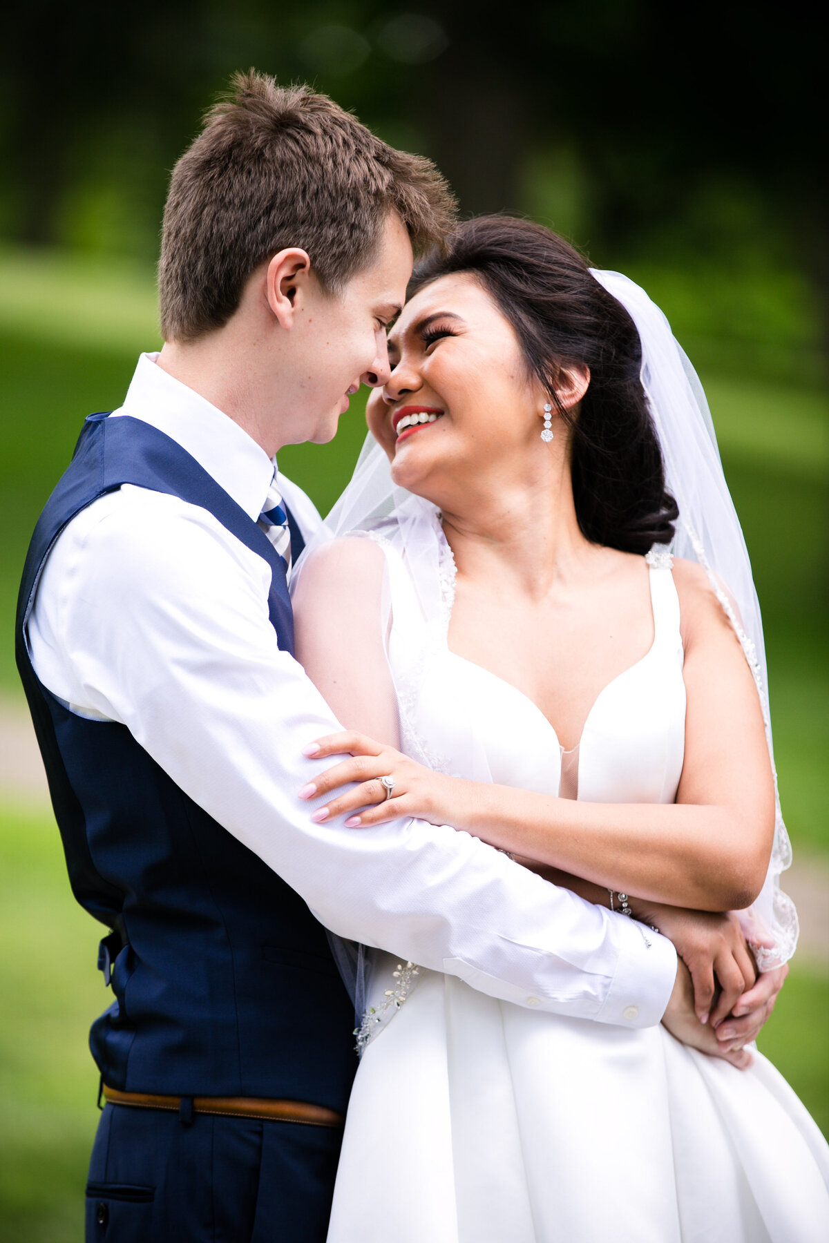 njeri-bishota-lauren-ashley-bride-groom-love-embrace-white-dress-beautiful-smile