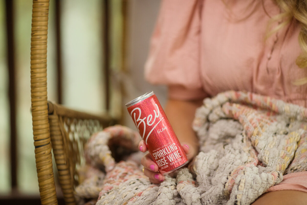 Influencer branding photo of a girl holding a drink