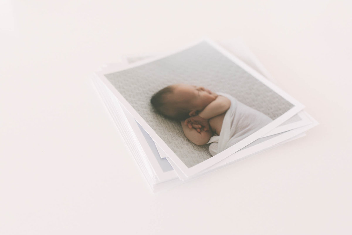 Laurie Baker with Elle Baker Photography offers professional printing options and birth announcements