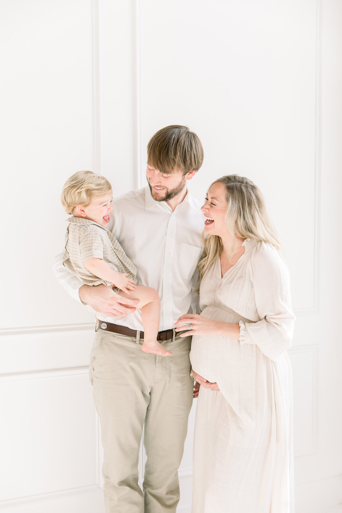 family during studio maternity session