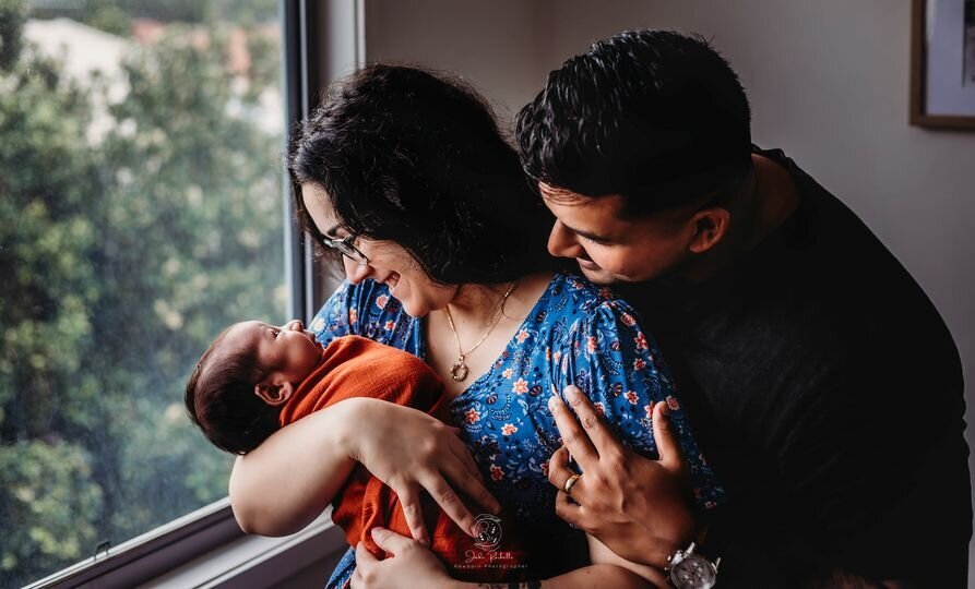 newborn boy with mum and dad