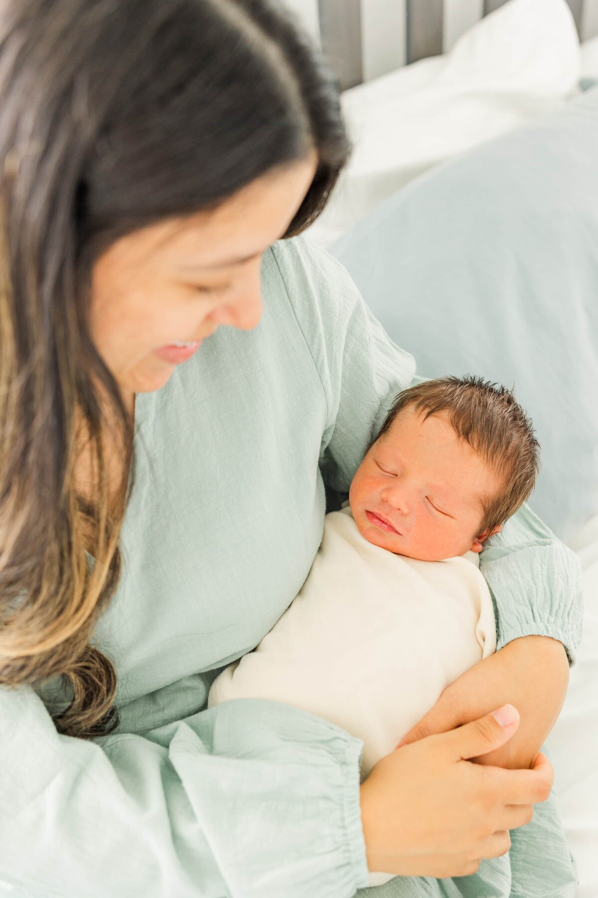 mom holds new baby