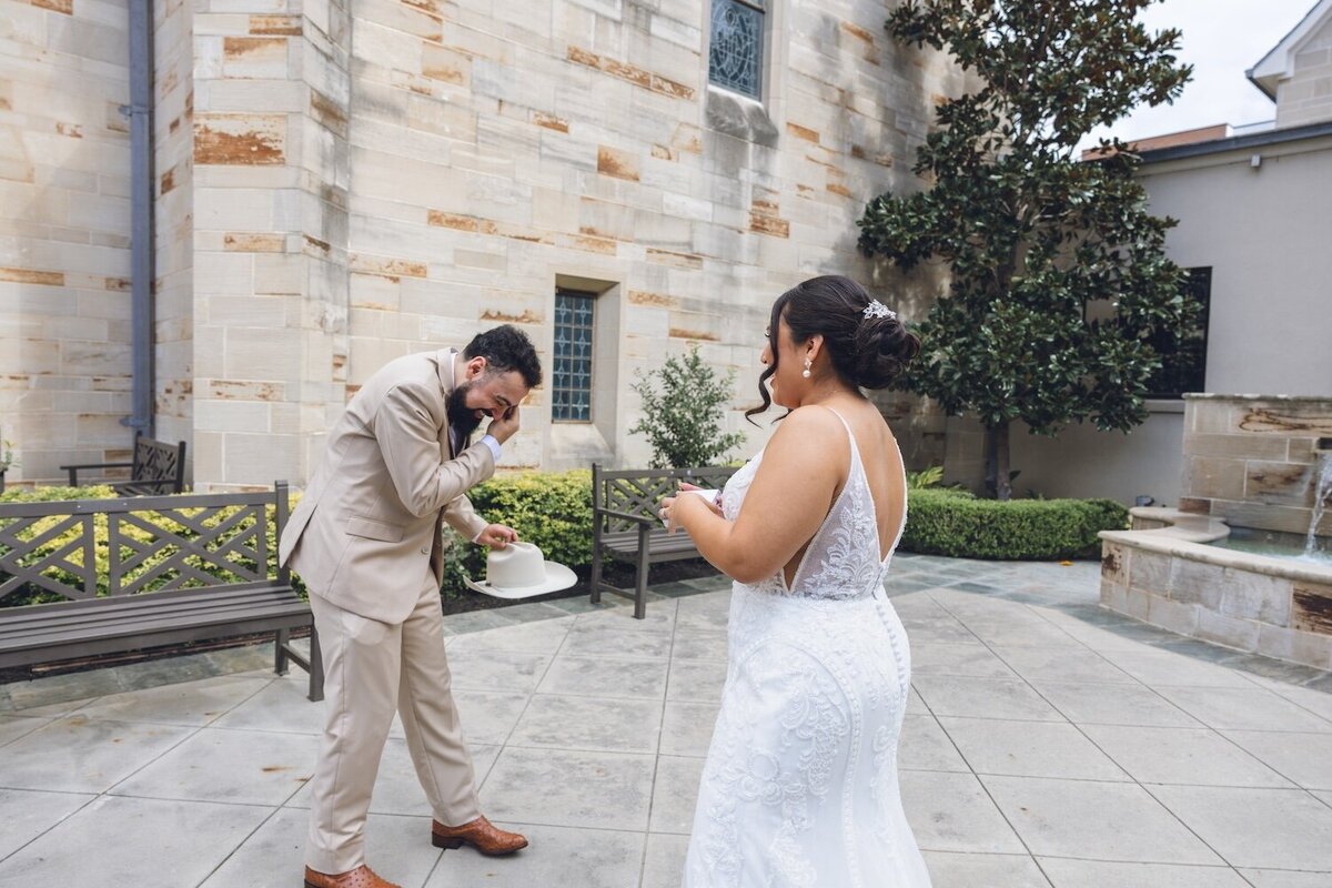 Groom's emotional reaction to bride during first look