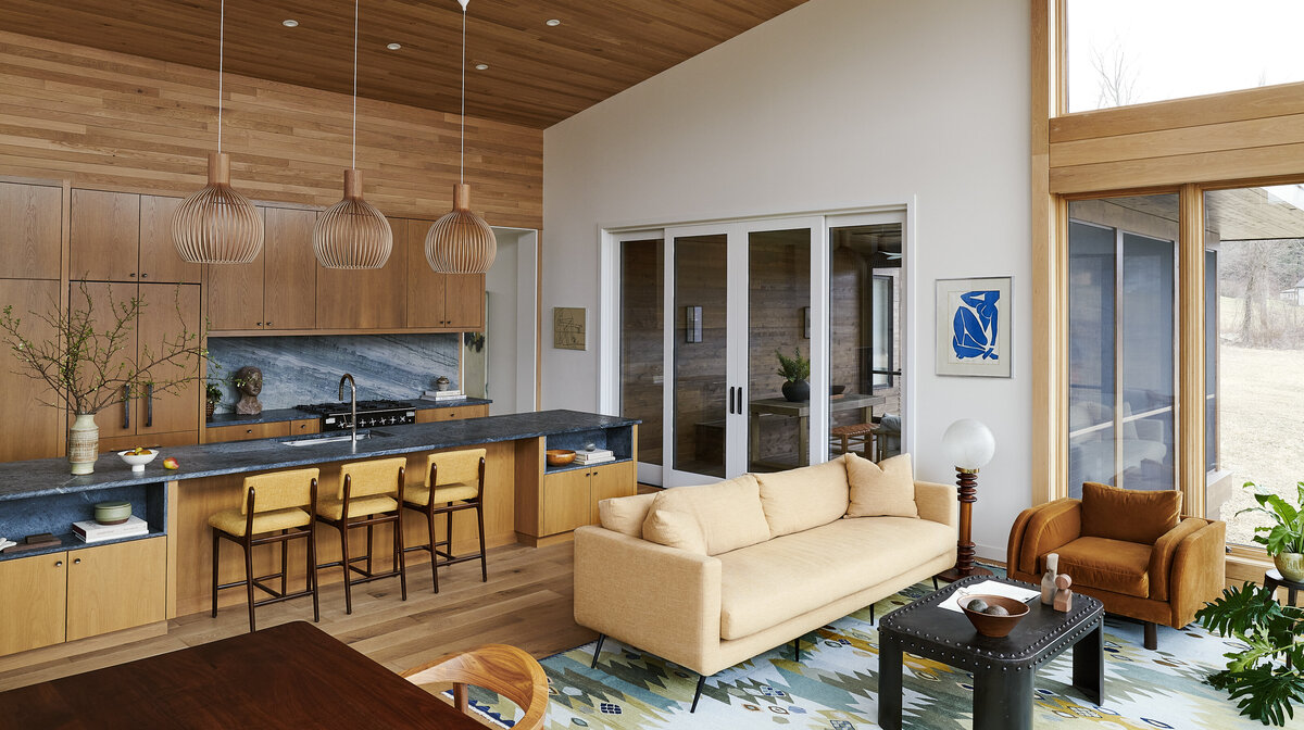 Triple height windows great room with incredible views of the Berkshires. 