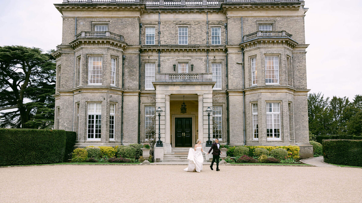 A wedding day photo of the bride and groom at Hedsor House in the Uk