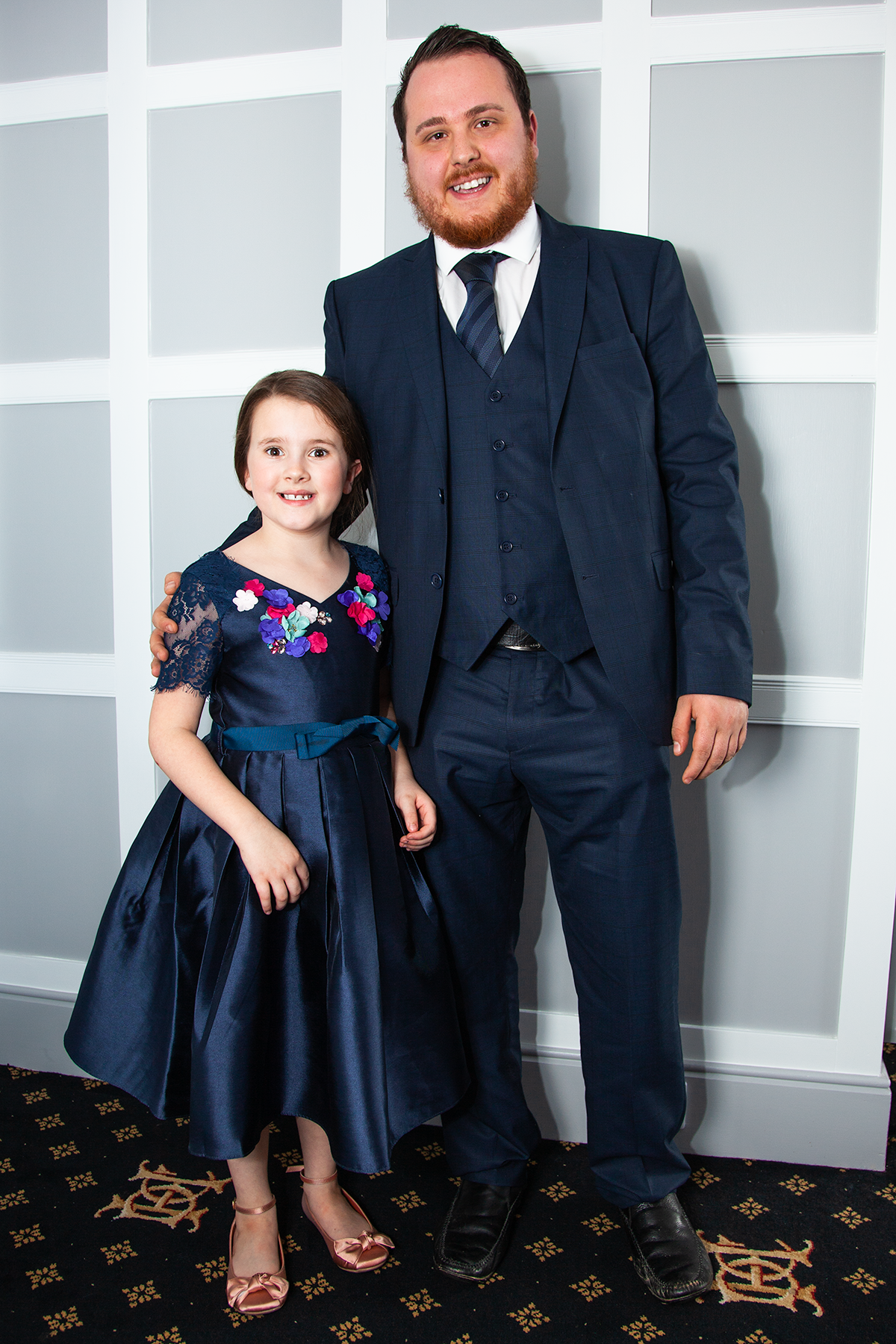pro-story-photography_groom-with-young-girl_duke-of-cornwall-hotel_plymouth