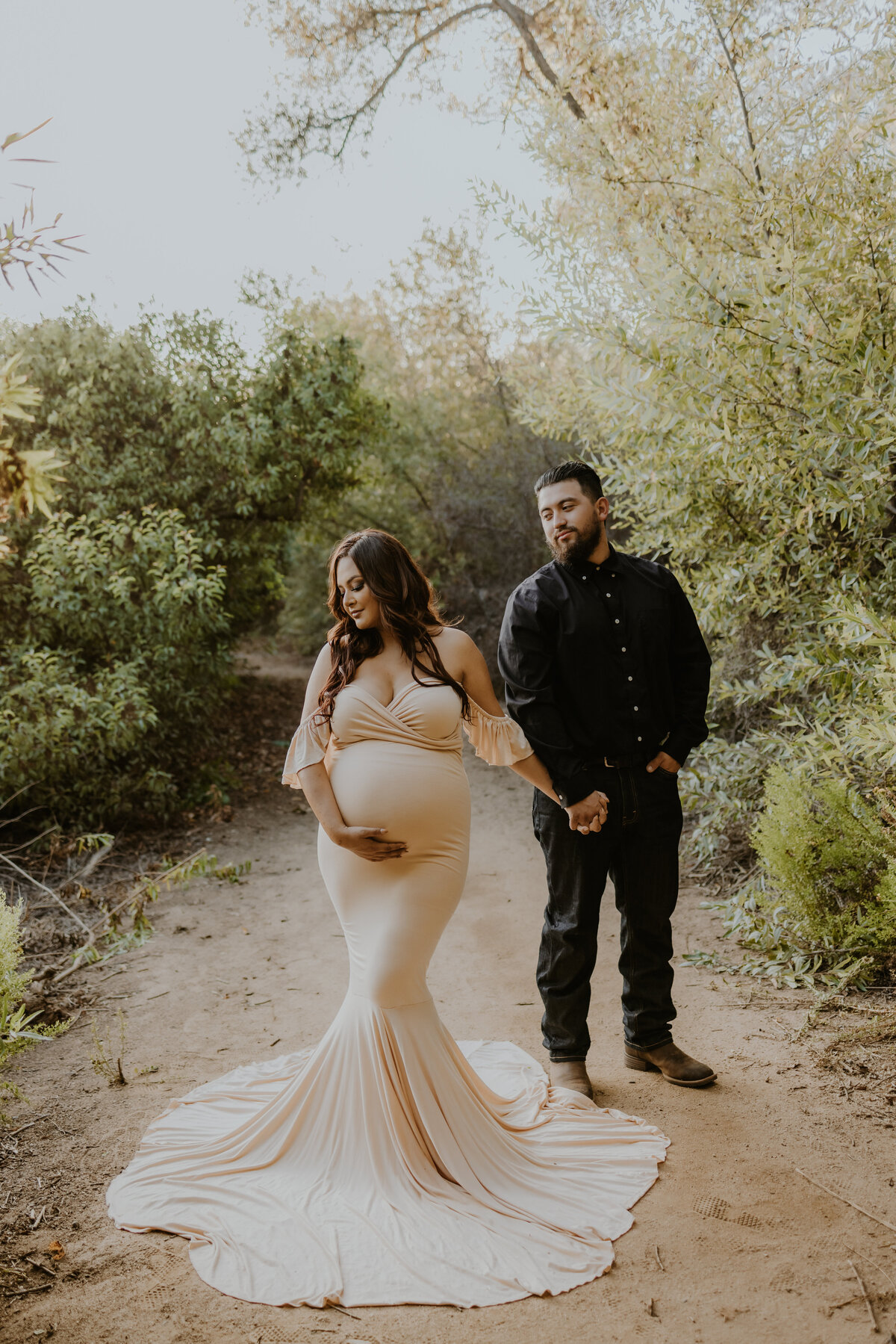 Breathtaking  photo with mother to be in long maternity dress with her husband Temecula, California Wedding and lifestyle photographer Yescphotography