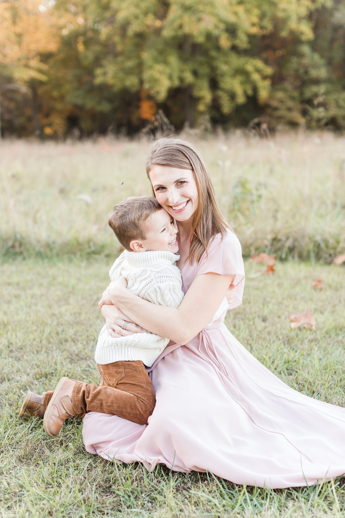 A photo of a mother holding her son for a hug by northern virginia family photographer