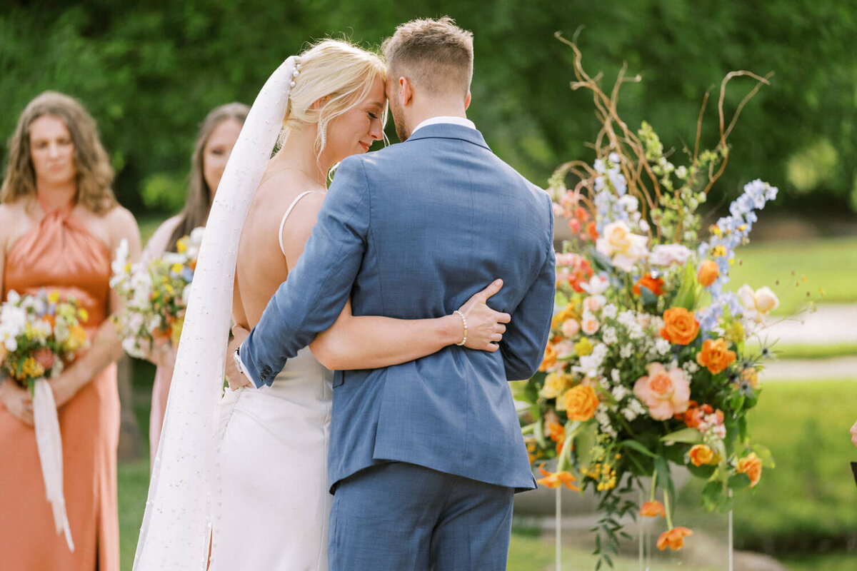 couple-foreheads-touching-during-ceremony