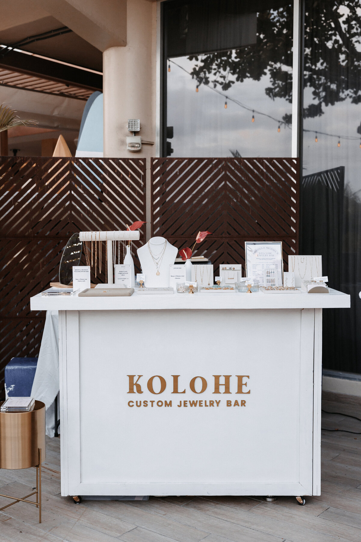 Jewelry counter that reads Kolohe custom jewelry bar
