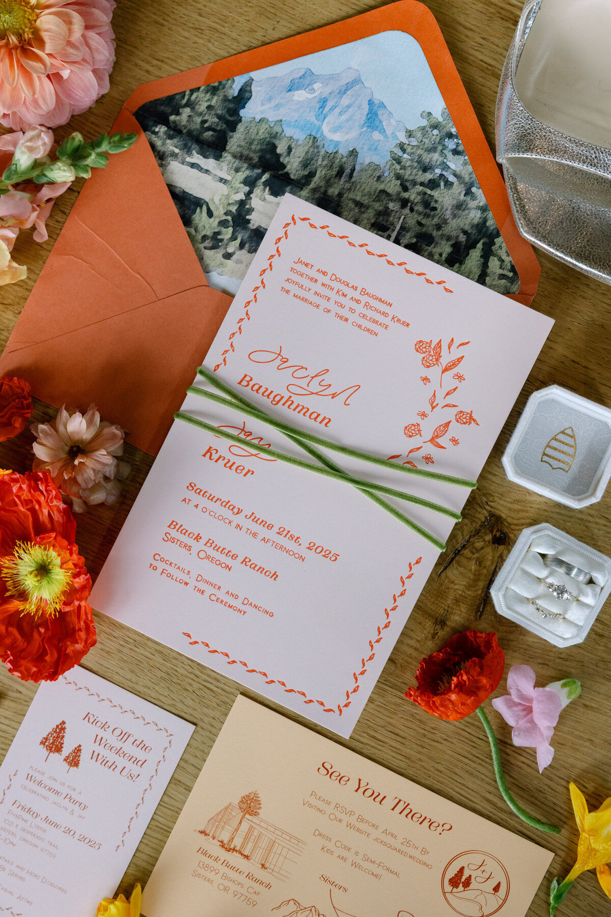 Coral and peach wedding invitation with calligraphy custom details, florals and berries representing full service design and calligraphy by Life in Letters.