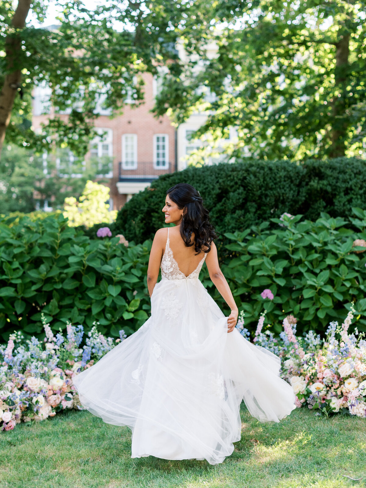 Brielle-Davis-Events-Meridian-House-Summer-Wedding-Romantic-Elegance-bride-twirling-ceremony-site