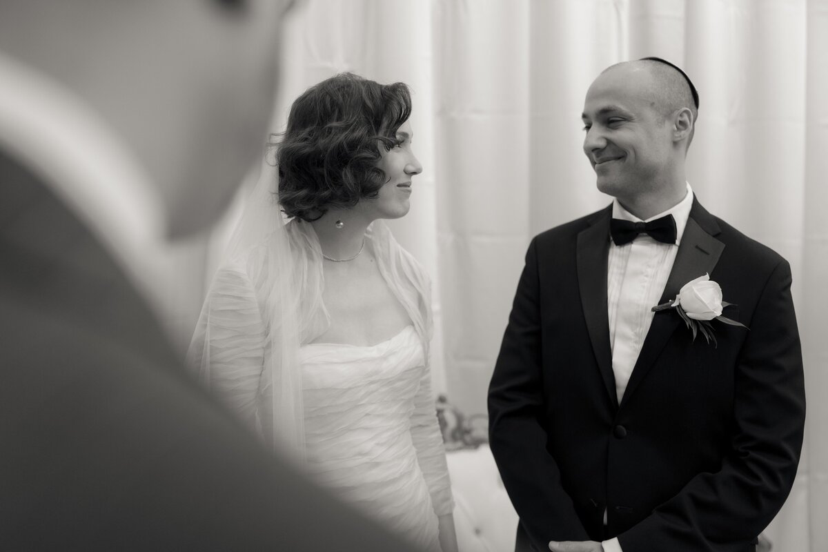 bride-groom-looking-at-each-other-wedding-day