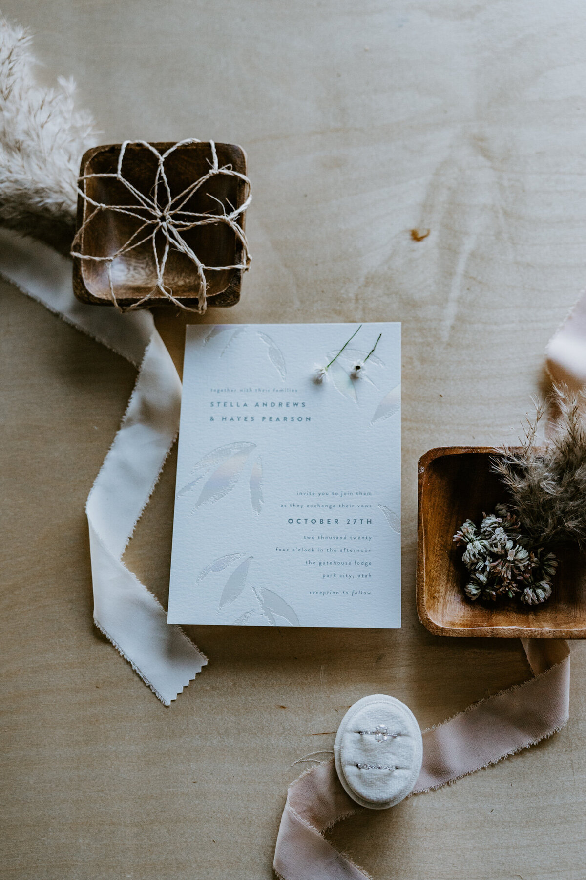 flat lay of wedding invites