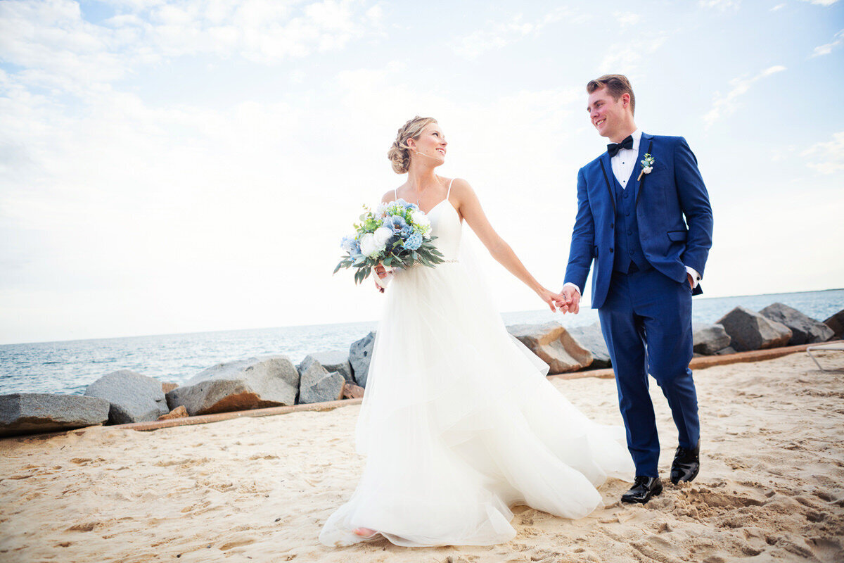 Bride and groom walking at Seabrook Island Club Charleston Wedding Photographer