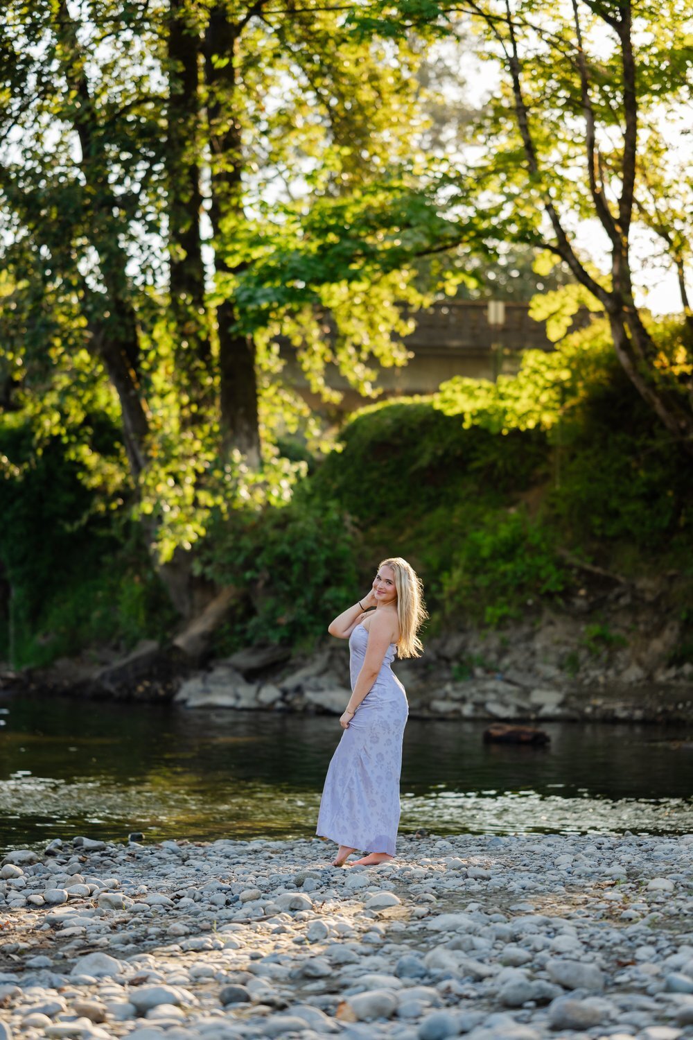 girl poses at river park in monroe
