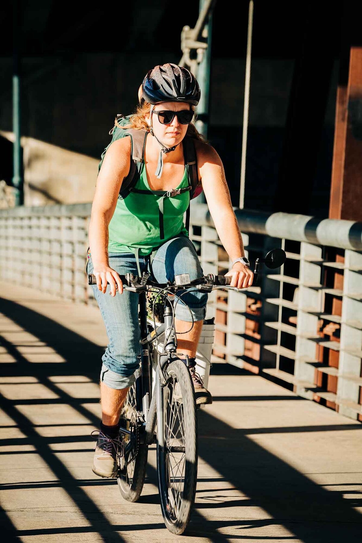 Woman riding bicycle in Missoula, MT