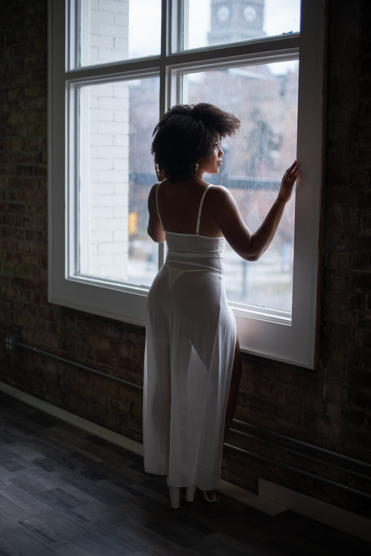 Diverse boudoir session photography highlighting a woman's silhouette against a window.