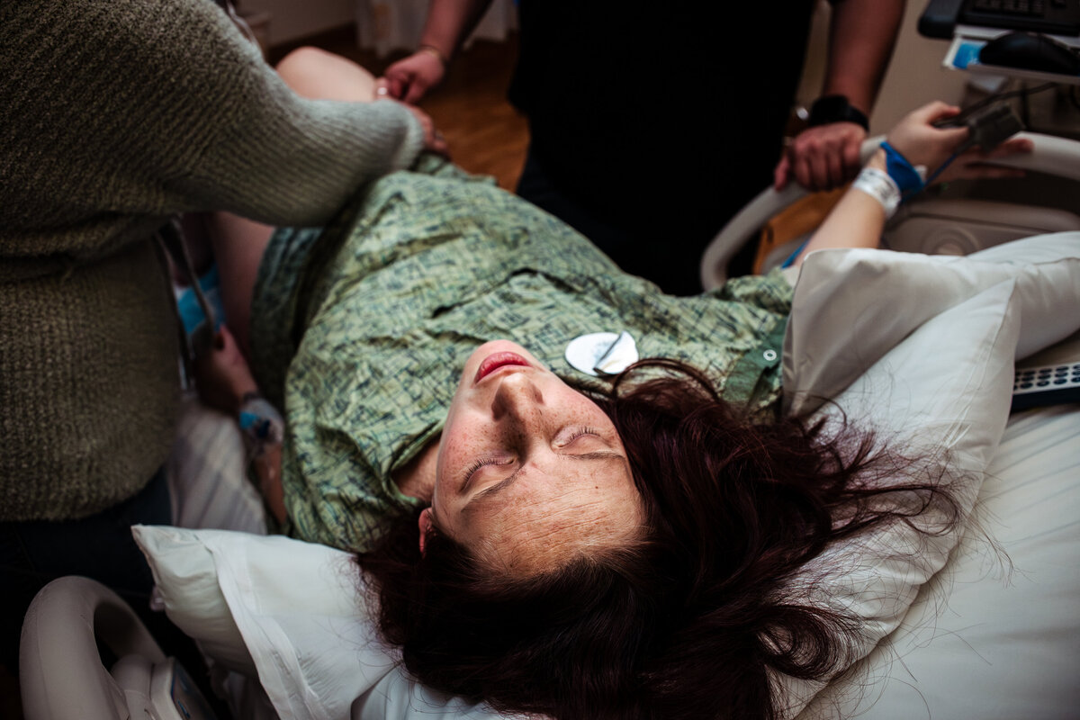 A mother in labor having a contraction