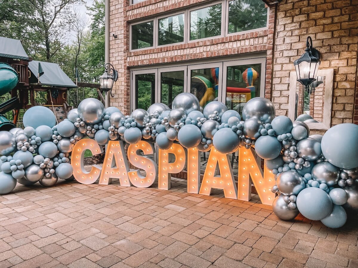 Giant blue and silver balloon display on Caspian marquee letters