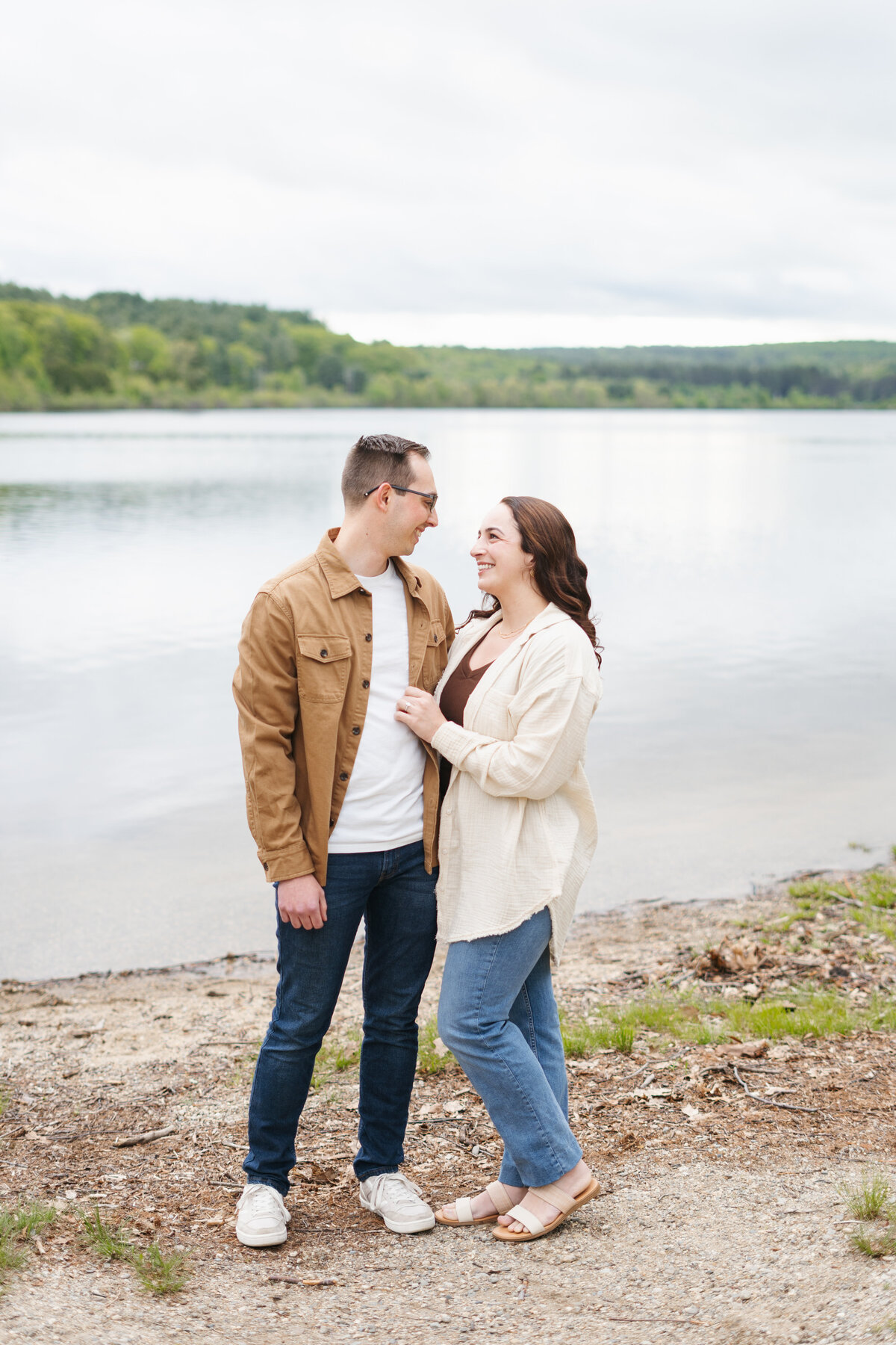 Couple looking at eachother during engagement photos 