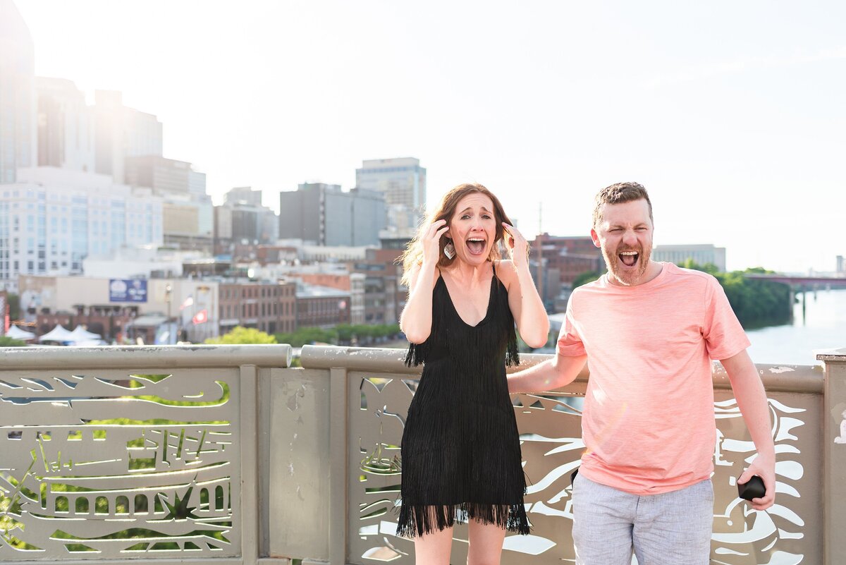 Surprise-proposal-photos-in-Downtown-Nashville-Pedestrian-Bridge+3