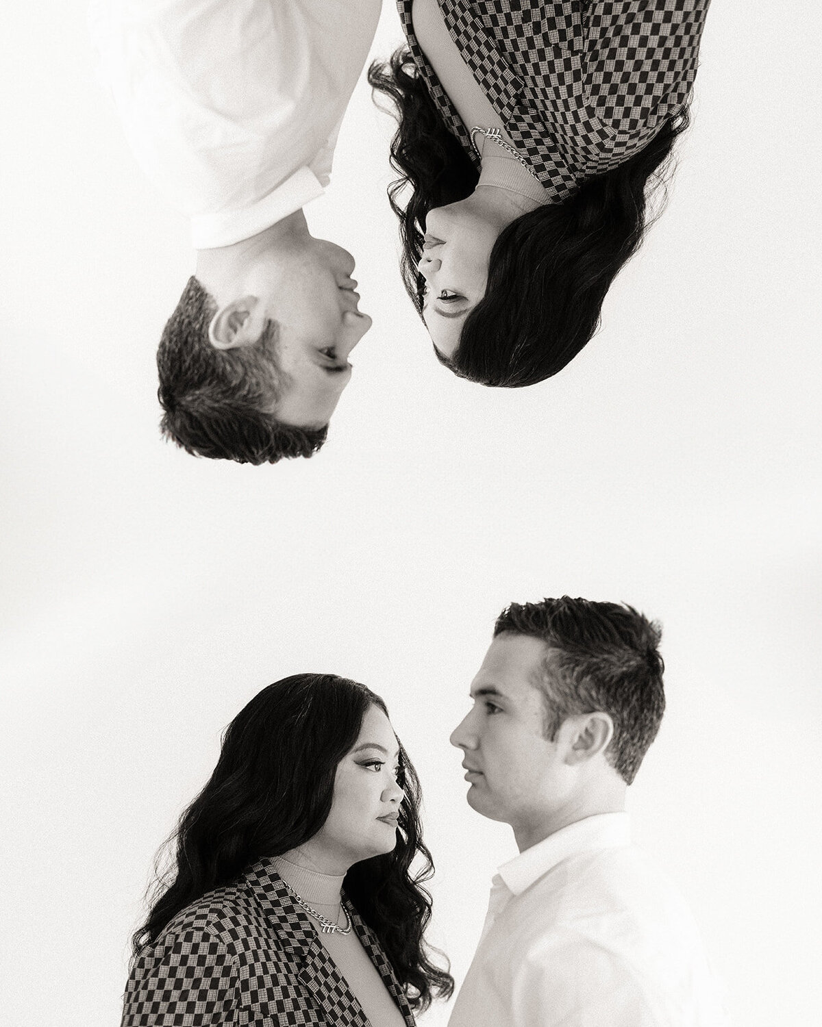 Two people look towards each other