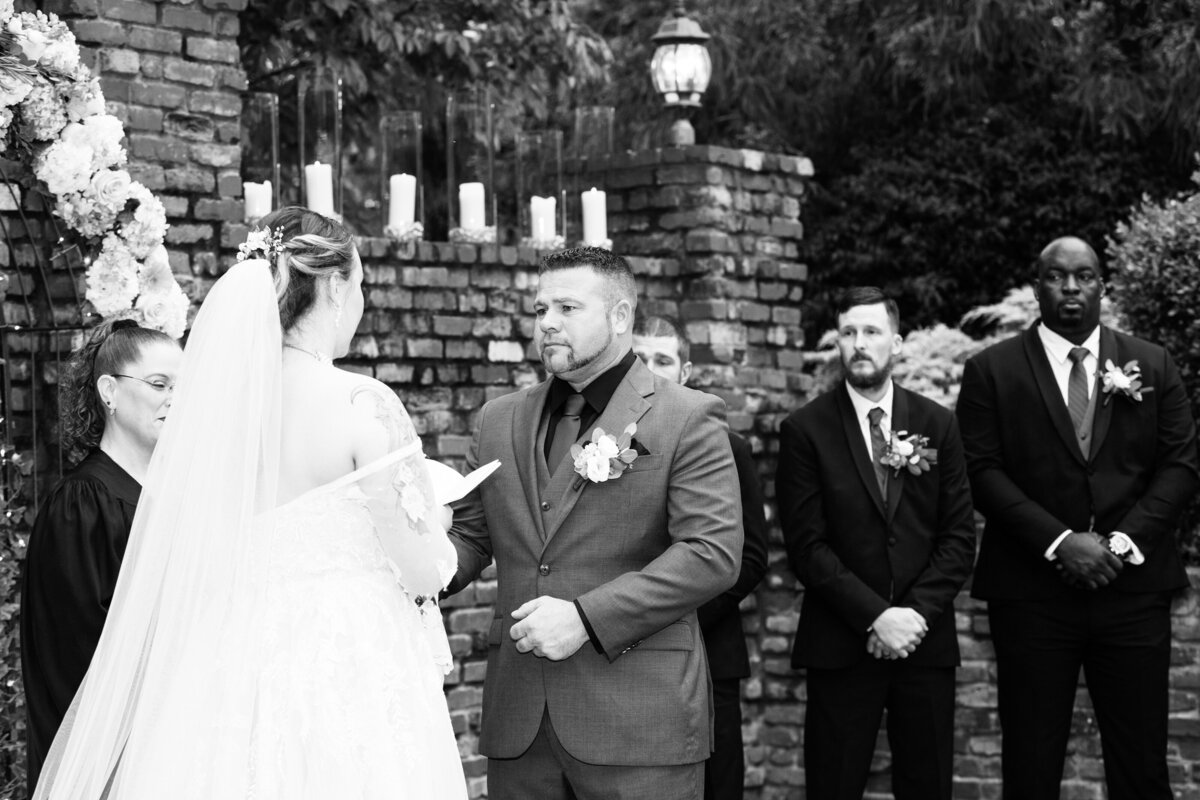 Atlanta-Black-and-White-Wedding-Photo-Groom-Listening-To-Vows-Carl-House